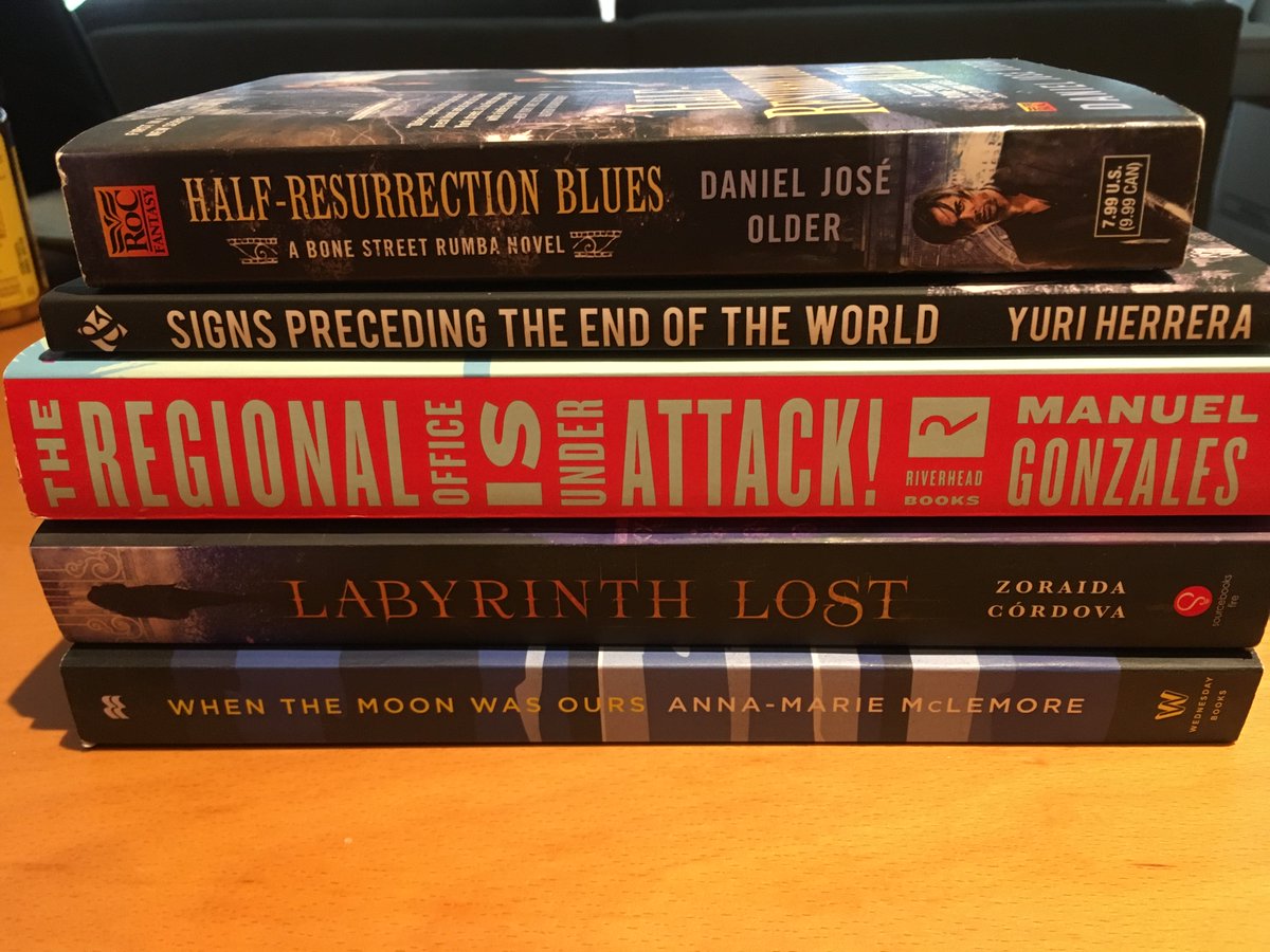 A stack of books, titles listed below