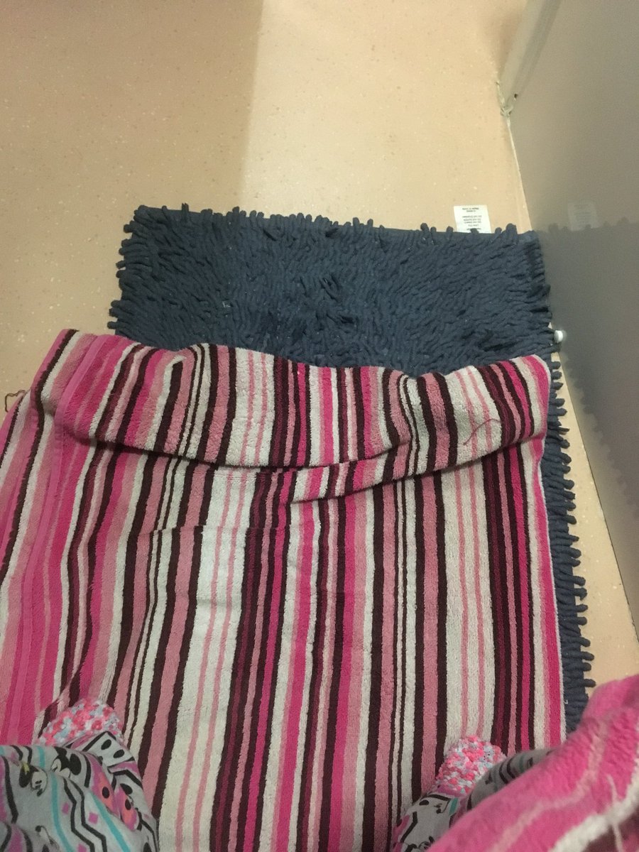 Cheygreaves's tweet photo. My bed for the night snuggled up on the bathroom floor near to the loo 🤮🤮 https://t.co/bYUz1M0MPv