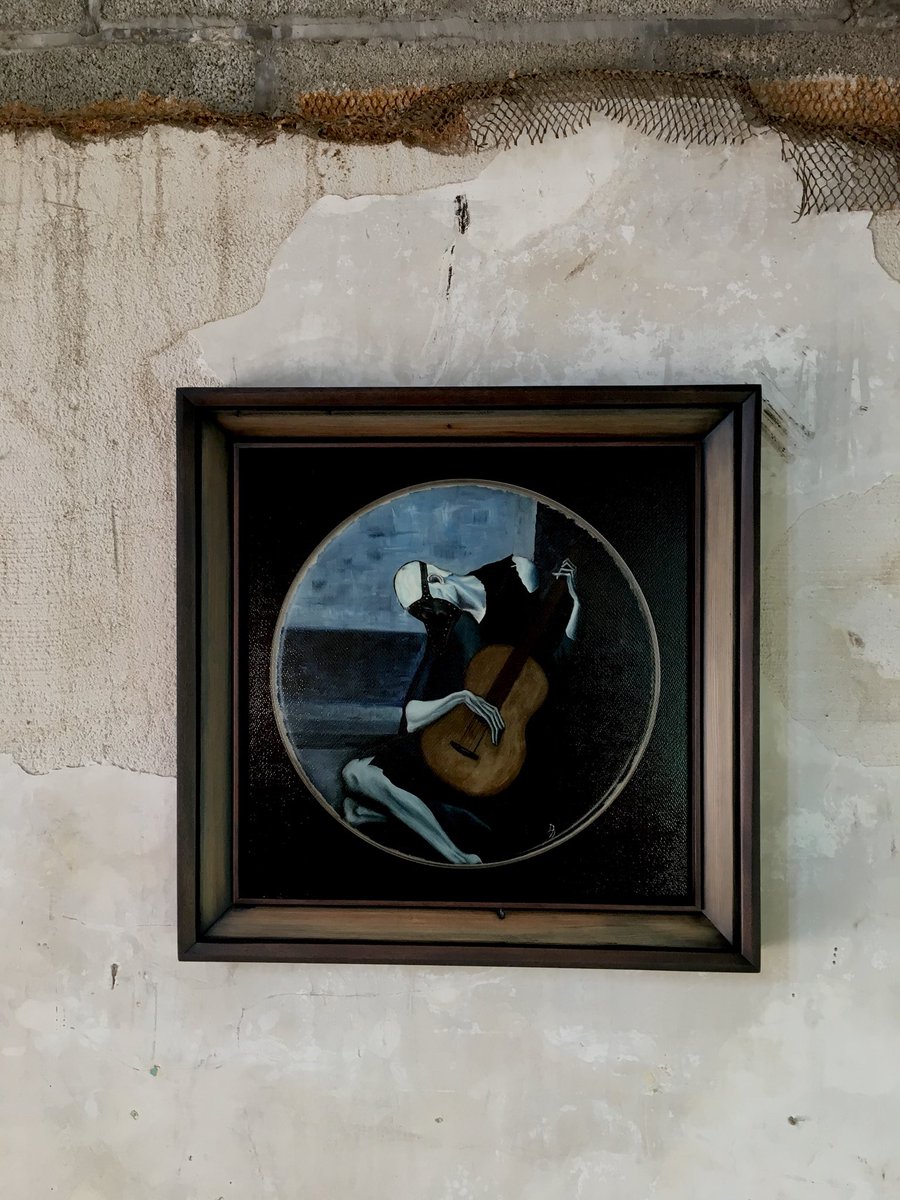 New frame for the print -The Old Plagued Guitarist- the oil painting was originally done on a drum head during the La Gargola era & is basically a copy of a Picasso painting titled-The Old Guitarist- naturally I added-Plagued- & the plague mask💀