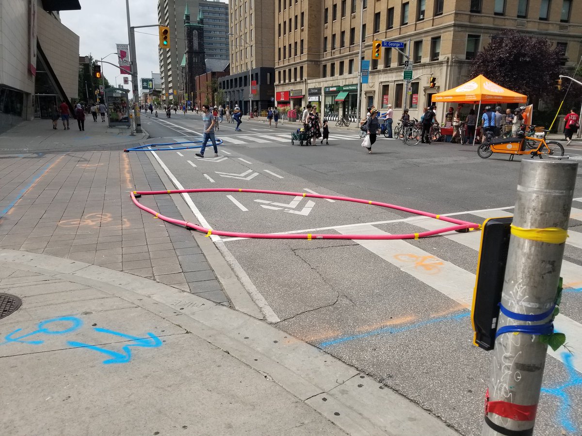 CycleToronto's tweet image. Catch our Campaigns &amp;amp; Engagement Manager Kevin setting up a #ProtectedIntersection Demo at @OpenStreetsTO tmw! Come on by Bloor &amp;amp; St George from 10-2 to experience a design that benefits all road users @BloorLovesBikes #BikeTO #OpenStreets #BuildtheGrid