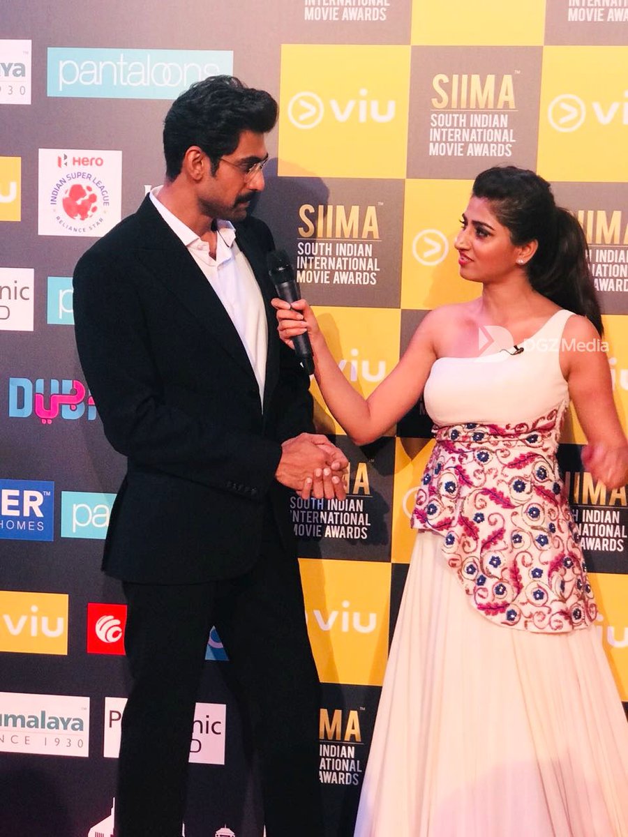 DGZMedia's tweet photo. These glasses on the handsome @RanaDaggubati clearly make him look nerdy and serious. Your opinion? 👓

#SIIMA2018 #SIIMA #PantaloonsSIIMA https://t.co/P7VCv6FANR