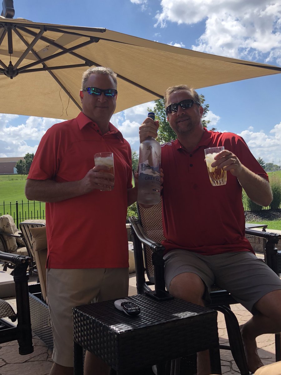 goosecup's tweet photo. 2018 Goose Cup Opposing captains having a cocktail from the Trophy bottle https://t.co/pR8jyFghdp