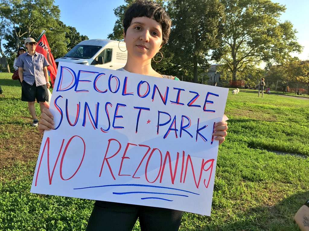 AshAgony's tweet photo. #BKMarch2018 marched through #SunsetPark Brooklyn earlier today to protest gentrification, racism, & police violence. They made stops at gentrifier spot Industry City & the NYPD’s corrupt & violent 72nd precinct then ended in the park. Lots of cops followed them the whole time. https://t.co/9d7Tlhgysb