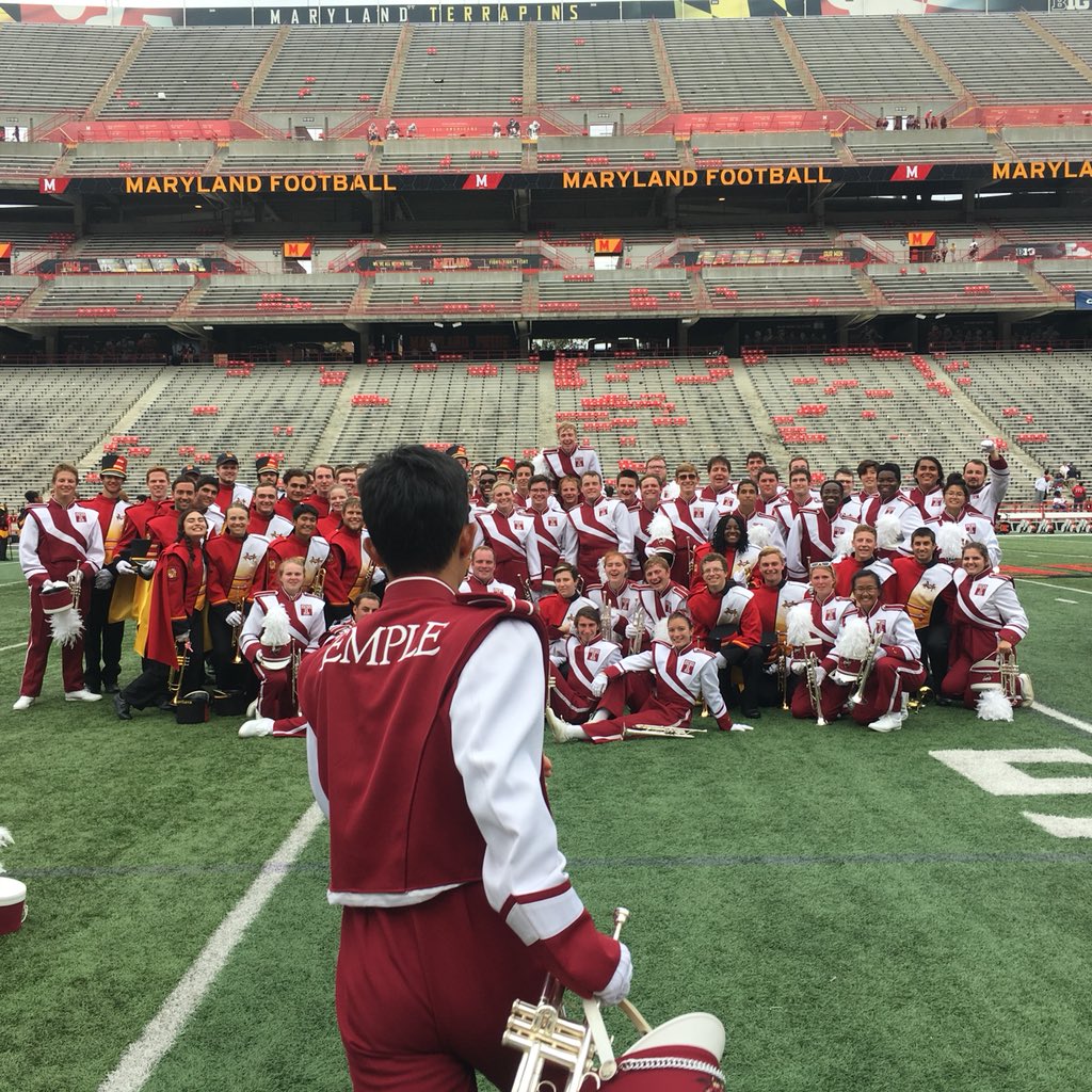 TUDMBTrumpets's tweet photo. It was fantastic meeting @UofMaryland marching band!! Plus Gideon got in the middle of one of our pictures :,)) go owls! https://t.co/yQgGGT5C9e