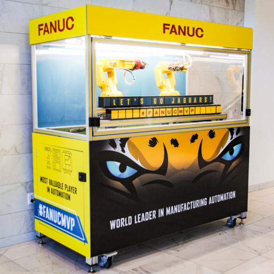 FANUCAmerica's tweet image. Noticing yellow amidst all the teal and white at the @TIAABankField for the @Jaguars first home game? @FANUCAmerica robots will be present all season long. Don’t miss your opportunity to see one (or all) up close! 
#DUUUVAL #JAXvsNEP #FANUCMVP