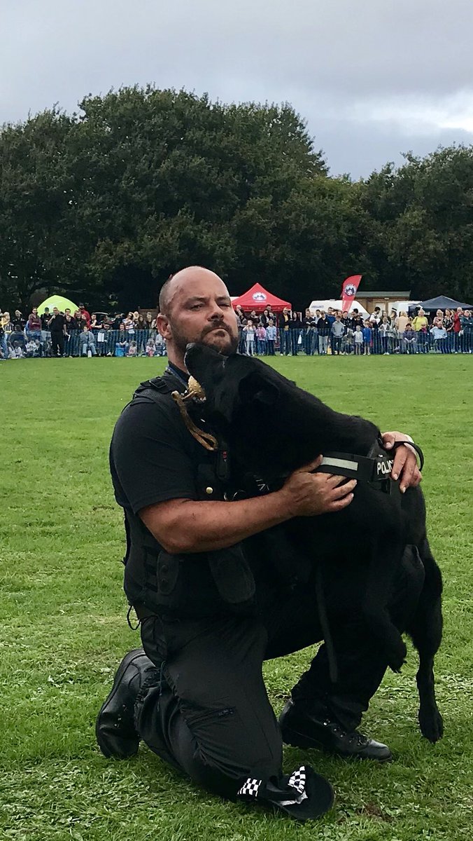 ASPoliceDogs's tweet photo. PD Bear got a special hug from his handler PC Martin after he detained an angry man as part of our display at the Force Open Day.  PD Bear’s last shift before retirement. Thank you PD Bear, you can put your paws up now 🐾 @999WAGS @SuMountstevens https://t.co/ef5iPKUjq2