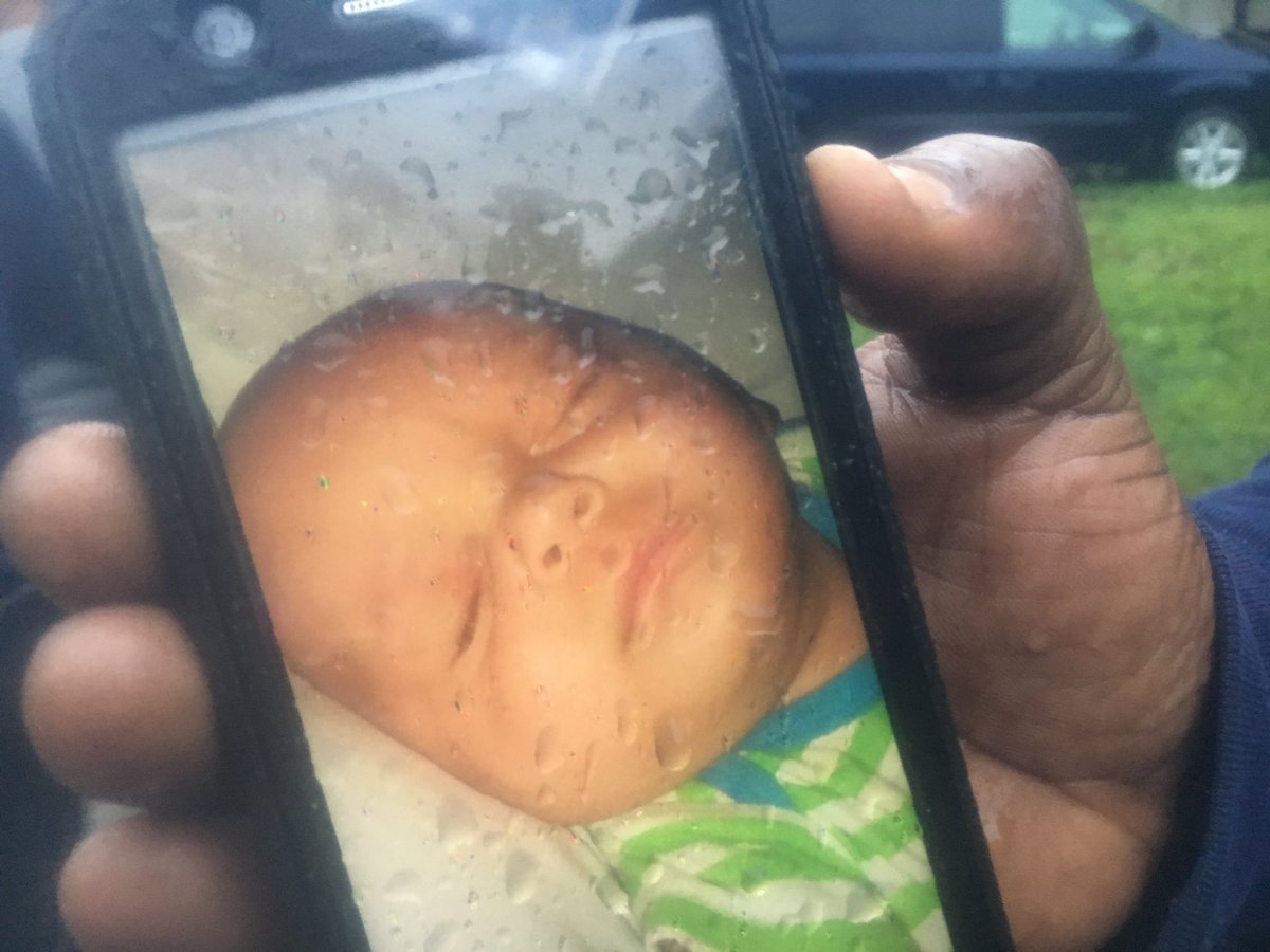 Parents hold picture of 3 month old Cade who died when tree crashed into his parents home. Mother was holding baby getting ready to feed him when tree came into home. Today is Cade’s 3 month Birthday. Parents are heartbroken ⁦@WBTV_News⁩