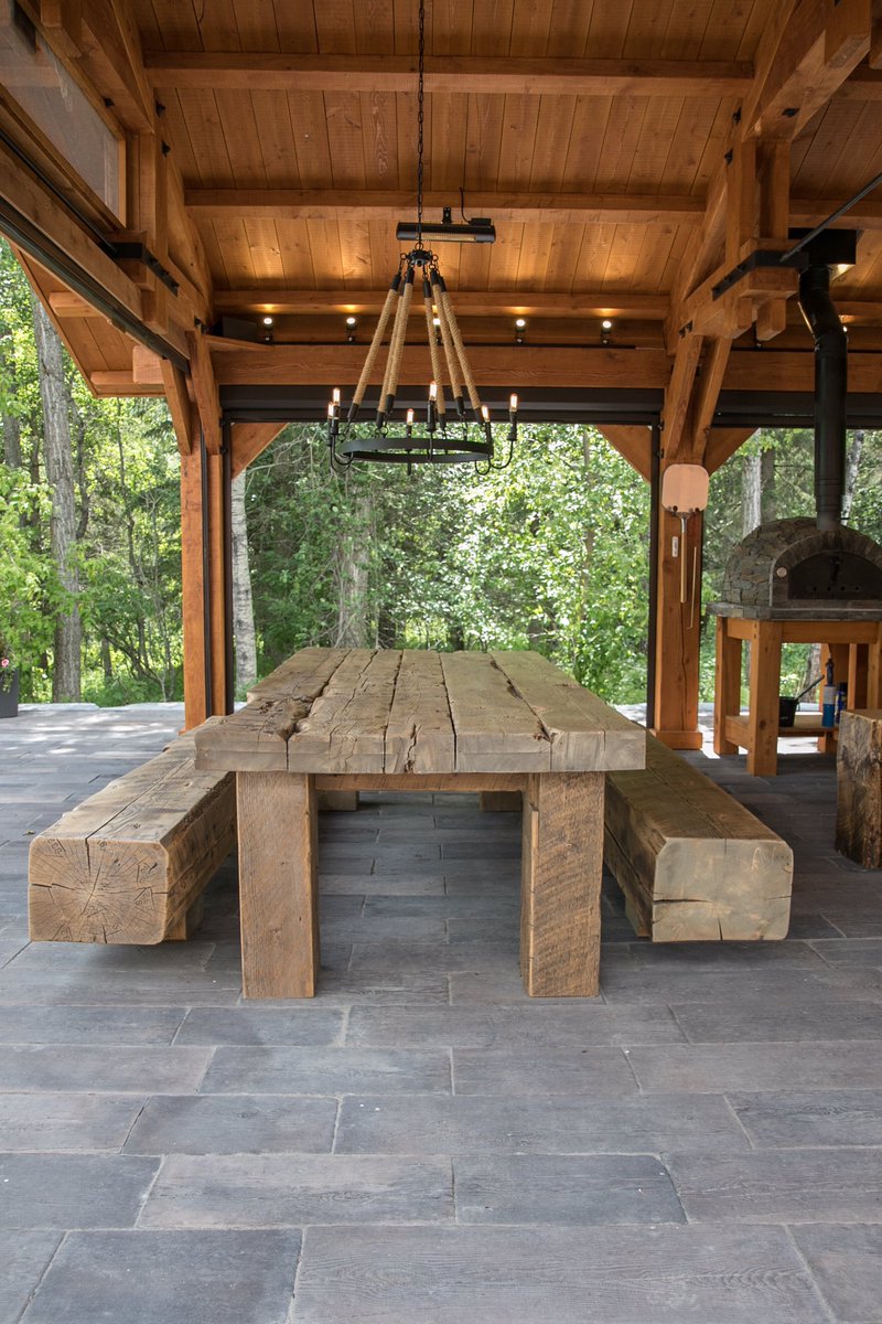 Collyerconstruc's tweet photo. This table was built using reclaimed materials that are clearly full of so much character!  The result is a completely unique and beefy looking piece that fits perfectly in this awesome outdoor space! https://t.co/s6CGN1nhZR