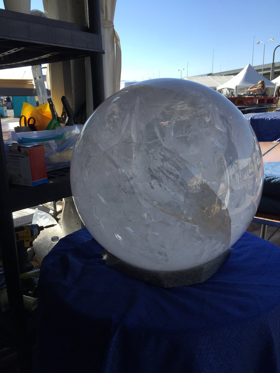 sakurasaturn's tweet photo. This bad boy is something I found at the Denver Gem, Fossil, and Mineral Show. I neither have the $$ or the space for this, but it’s so beautiful! Definitely a multi-day visit if you can swing it to see it all. #quartzcrystal #quartzcrystalball #DenverGemShow https://t.co/5dQ5xepeUN