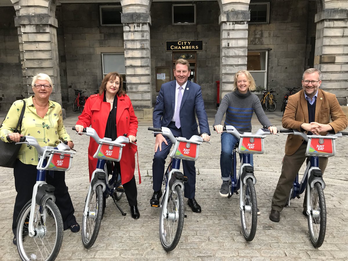 CllrChasBooth's tweet photo. Just realised that Instagram chopped me out of that last photo. Here’s the launch of @cyclehire_edi pic w me, other councillors & George from Transport for Edinburgh... https://t.co/Q0xIsn29tq