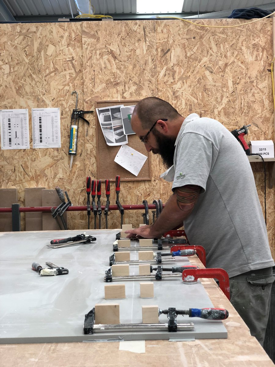 CuttingEdgeLLP's tweet photo. Piotre busy fabricating a bespoke reception desk for a central London installation. @coriandesign in Warm Grey to be seamlessly joined on site. #MotivationMonday #solidsurface https://t.co/iQ6w3Kg8gQ