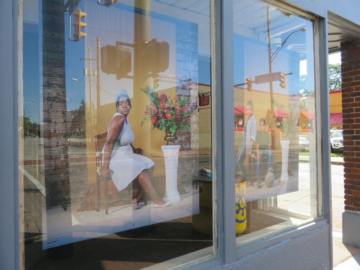 CLEPublicArt's tweet photo. (1 of 4) The Marigolds Project #PublicArt installation was unveiled on Saturday in the #Buckeye community. Part of #InnerCityHues, and led by Amanda King, and #ShootingWithoutBullets, with @cleveLANDstudio . You can experience this installation in the storefront of 13000 Buckeye. https://t.co/94AmrEPWAu
