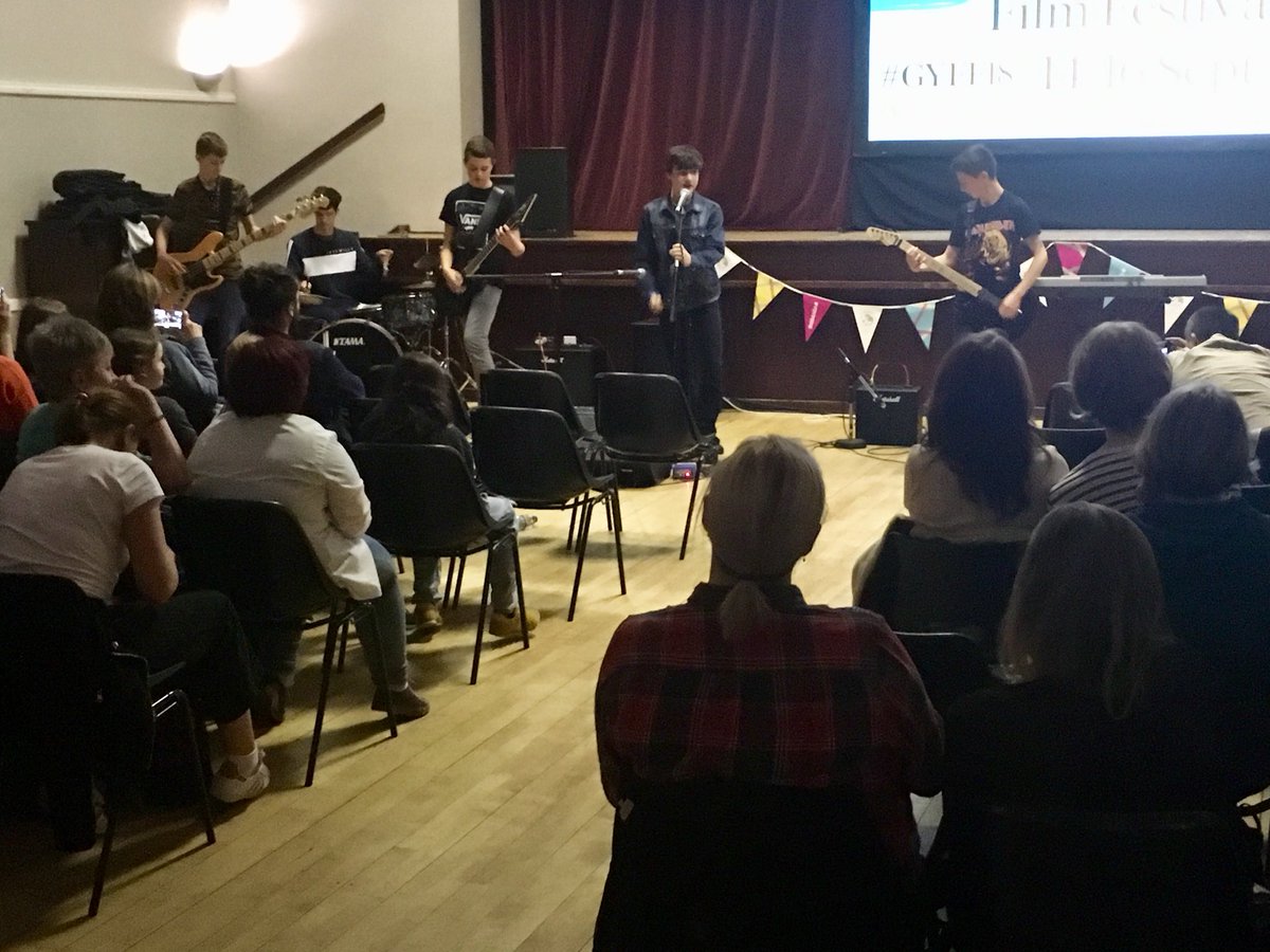 glasgowfilmedu's tweet photo. The GYFF Young Programmers introducing our Closing Gala film School of Rock at Blythswood Hall last night 🎸🎶 Also a big thanks to performers Vertigo and Mairi Macleod - both acts absolutely smashed it!  #GYFF18 #YOYP2018 https://t.co/mKEZOLwdKB