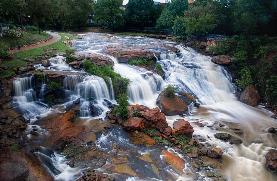 Greenville_SC's tweet photo. 🌧 A little rain makes Falls Park on the Reedy River even more awe-inspiring! // #yeahTHATgreenville

[📷: c.y.bradley on Instagram] https://t.co/cW44Otks2b