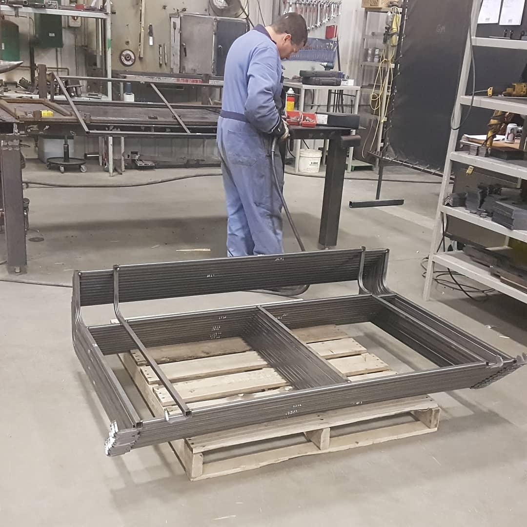 SweepAllTurf's tweet photo. Sweepers in production welding. Johnny welding the basket main frames and Albert tacking the basket door frames. #welding #sweepall #madeincanada #lawncare #turfsweeper #handbuilt #builttolast #builtwithsteel https://t.co/ubjchPSbNd