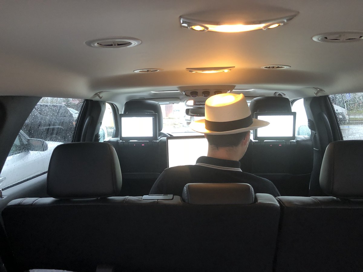 DarrenLaur's tweet photo. Rented a new Dodge Durrango in Alberta and @societaltech noticed it had twin LED screens in the back seat. He got an idea, and BOOM goes the dynamite he created a 3 screen display with his new MacBook Pro. Can you say mobile office OMG 👍😀🤪 #ivegotanidea #autohack https://t.co/OBdmFUSLTD