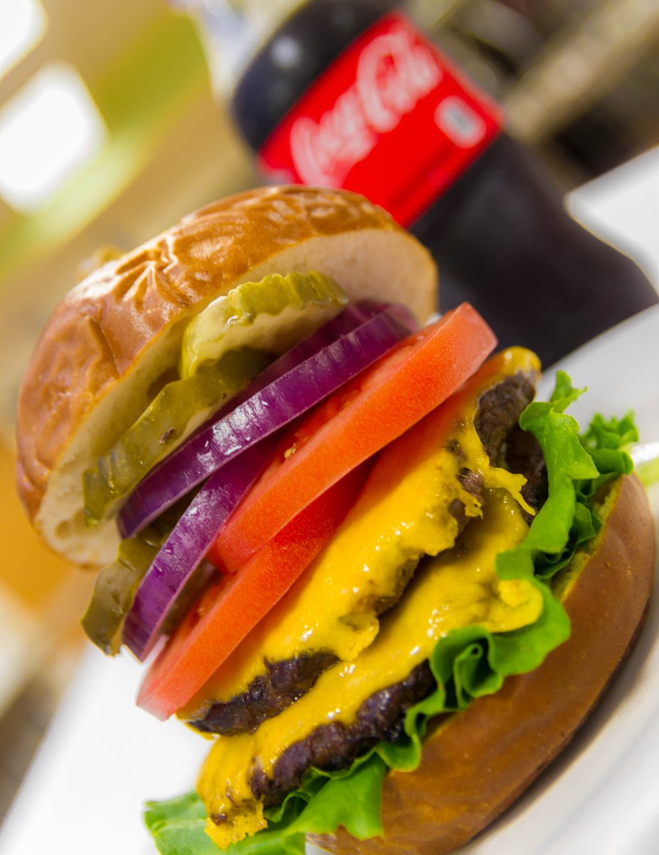 LynnAdmission's tweet photo. Hooray, hooray, it's National Cheeseburger Day! Did you know Lynn's Elmore Dining Commons is open 24/7? That means we can have burgers all day, everyday. Talk about savory news! @LynnDining #LynnCravings https://t.co/H6cOfpLwAs