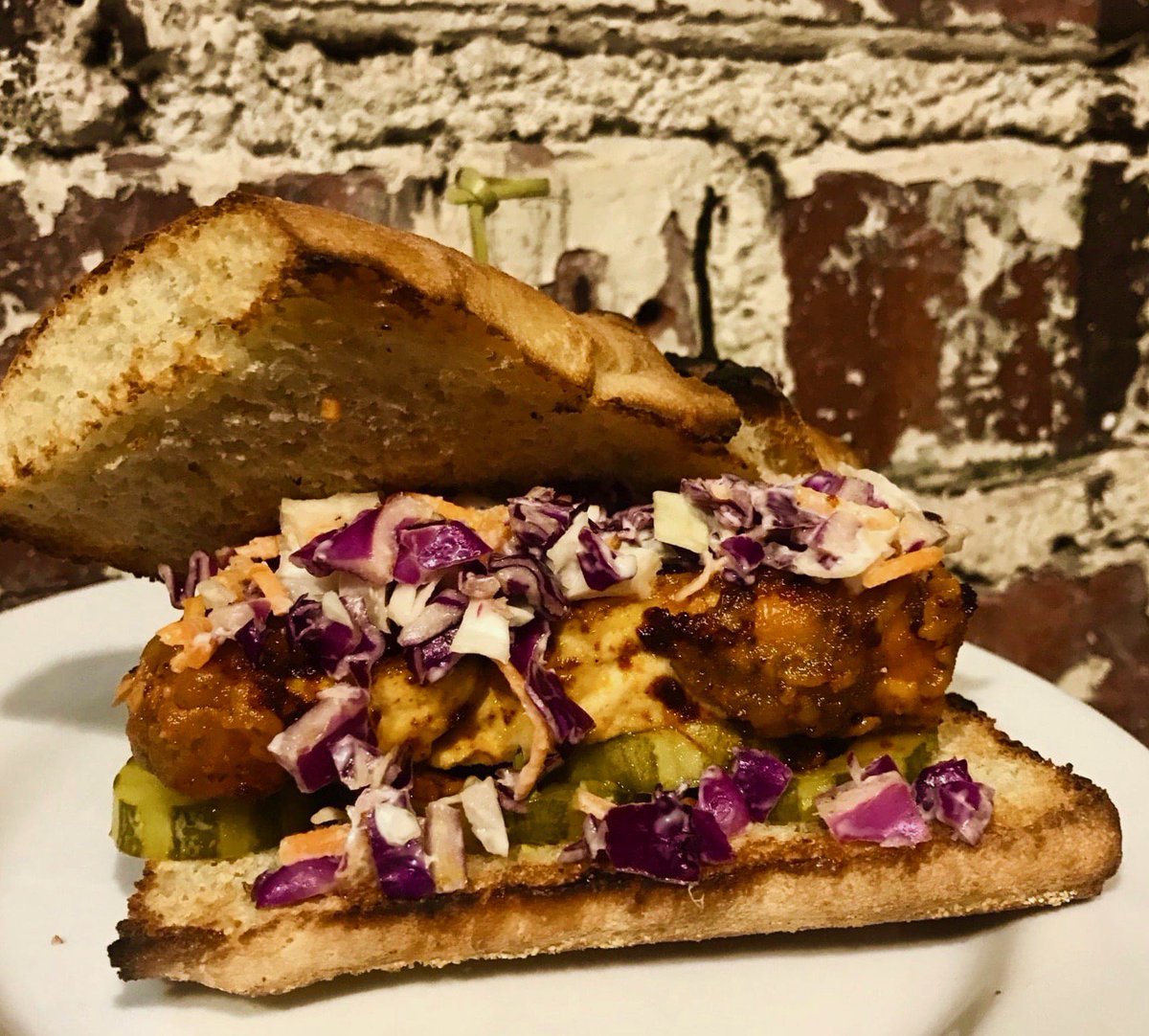 Tuesday's lunch special is Nashville inspired...
Come in and try our vegan hot chicken sandwich!
Vegan 🌿| GF Bread available 🍞