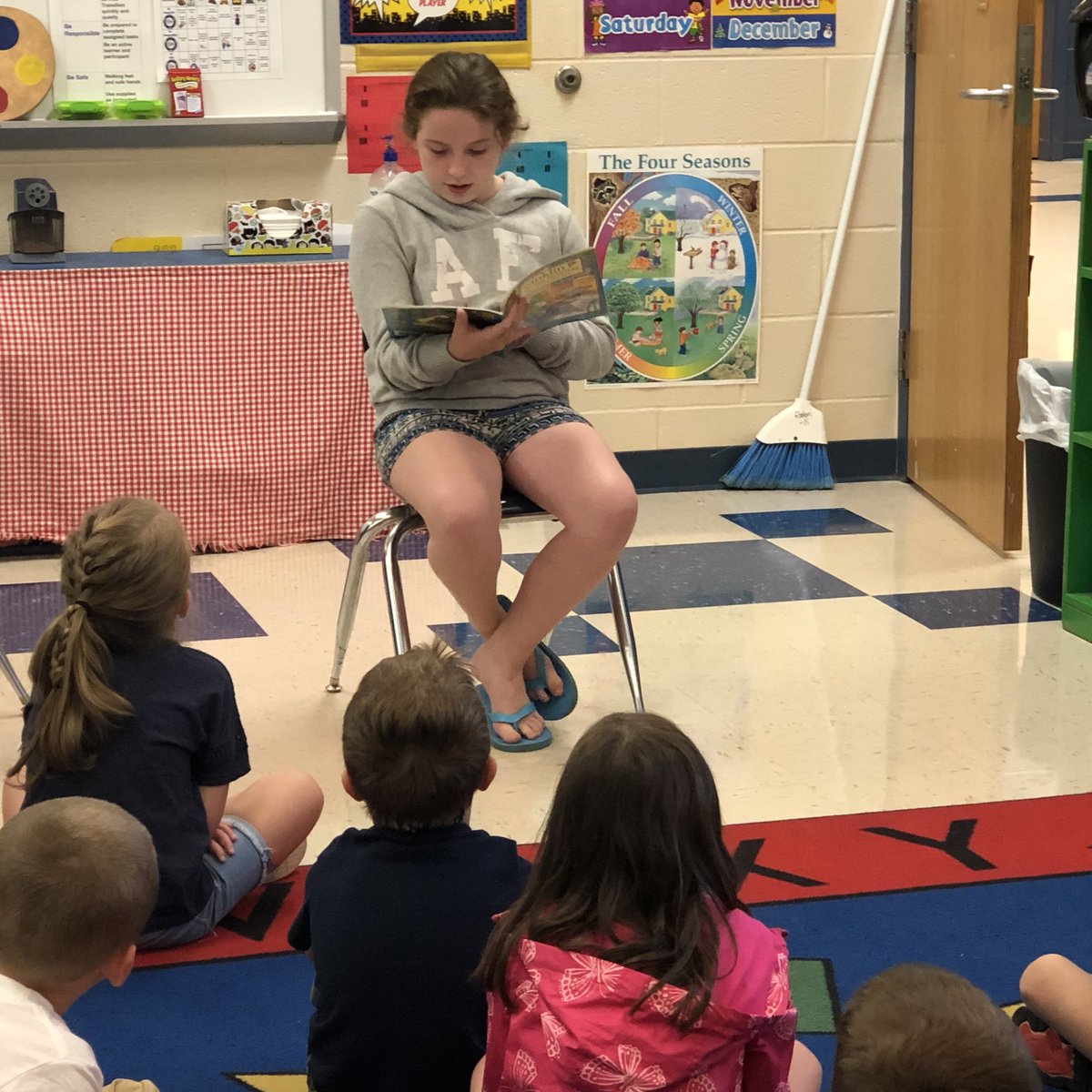 Hangin’ on Alivia’s every word! Older students reading aloud to younger students is a tried and true literacy strategy. #TCEStweets
