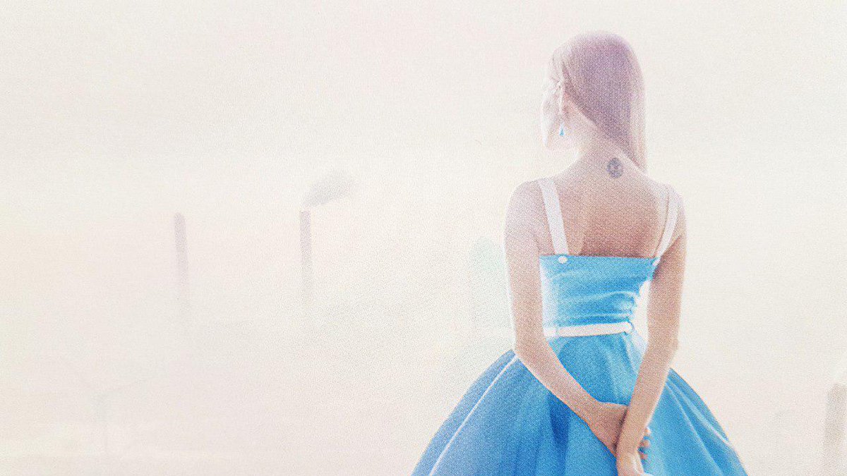 Who is this mysterious woman? Upon what does she gaze so intently?