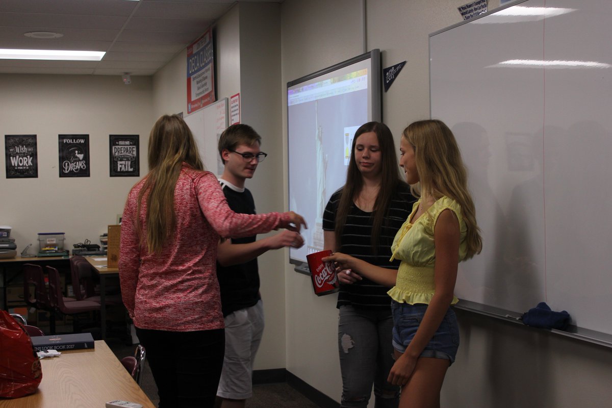 AHSBusinessDept's tweet photo. AHS Yearbook senior and the YB Staff member of the week, Madi Reade, lead the class in a game of Pictionary to work on communication within a team while working under pressure. #teamwork https://t.co/GM3O4zh4px