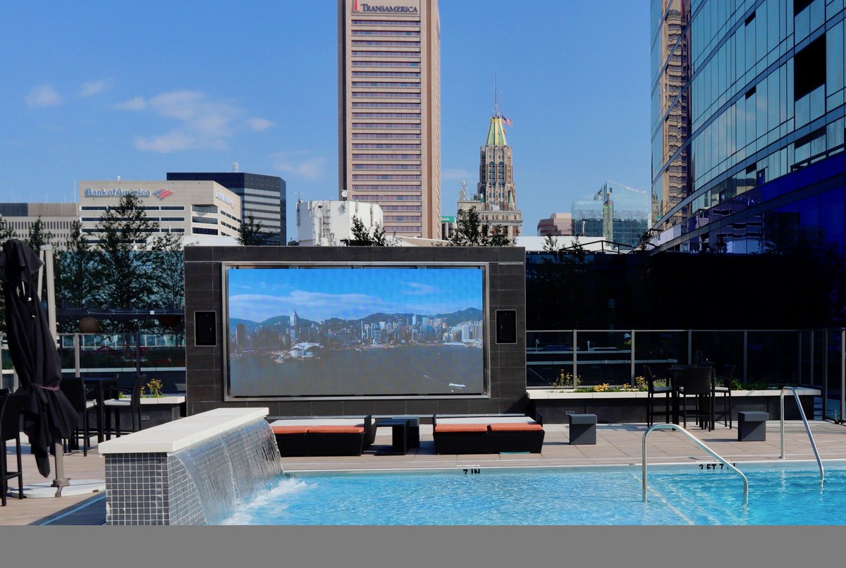 Avitecture's tweet image. With all the recent rain, we thought pictures of two 16-foot outdoor televisions on the 7th Floor Amenities Deck at 414 Light Street in Baltimore might cheer everyone up. Avitecture installed these direct-view LED video displays and outdoor sound systems.