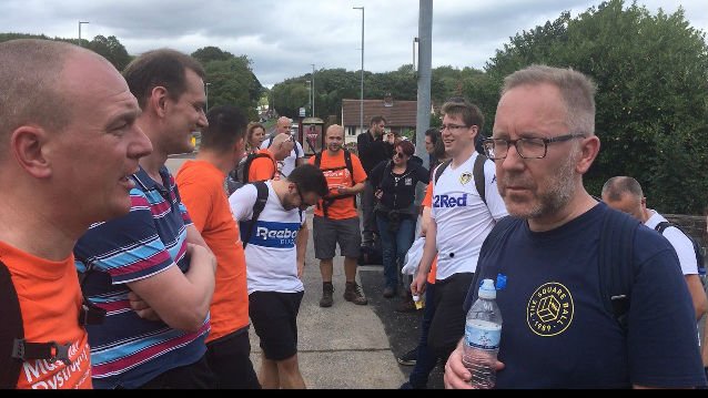 🗣 "It's for two great causes"

🎸️⚽️ Hear why 24 Leeds United supporters including
<a href="/curlywand/">Simon Kaiser 🤍💛💙</a> <a href="/KaiserChiefs/">Kaiser Chiefs</a> <a href="/ianharte23/">Ian Harte</a>, <a href="/jonhowe1971/">Jon Howe</a> @DingleburtDev
<a href="/sharonreid/">Sharon Reid</a> are walking 34.17 miles between #lufc, #bcafc &amp; #htafc

<a href="/MDUK_News/">Muscular Dystrophy UK</a> <a href="/Leeds_Childrens/">Leeds Children's Hospital</a>

👂⏩ bbc.in/2NXKNRi