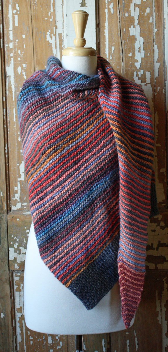 This brightly striped scarf by Tori Gurbisz is a multi-directional knit. Using two contrasting colors of Universal Yarns variegated Classic Shades. To get the Harmonize Scarf in a Yarn Box: ow.ly/mCsD30lRYh5