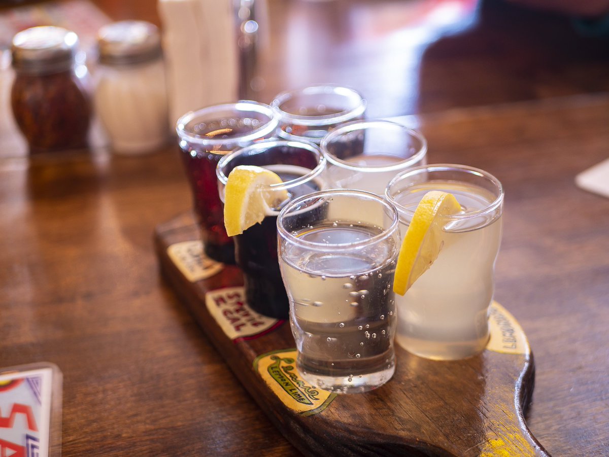 Gainesville's tweet photo. A8: @Satchelspizza is a must eat experience while visiting @alachuacounty! Homemade sodas and delicious pizza both in a one-of-a-kind setting of VW Busses and Plane Fuselages. #FLTravelChat #whyIlovegnv #exploregnv https://t.co/R9IrTP8z9b