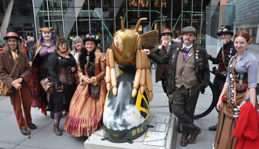 Ev_Sinclair's tweet photo. The lovely Cottonpolis Coglective (Manchester Steampunks) visit my Rocket @thesteampunkbee on their annual Steampunknic - splendid! Wish I could have been there! Thanks to cool-dude Stuart Ardern of @LazyBeeScripts for the great photo @beeinthecitymcr #BeeInTheCity https://t.co/ytS0HHTHOl