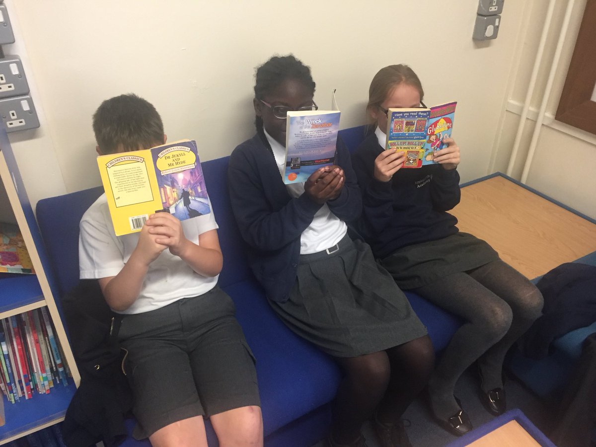 ApplegarthAc's tweet photo. Look who I found hiding in the book corner! Year 6 pupils getting ahead with their reading. Too busy to talk to me... obviously! #AcceleratedReader #empower #ApplegarthPRIDE #aspire #STEPup https://t.co/eTPI45WqzH
