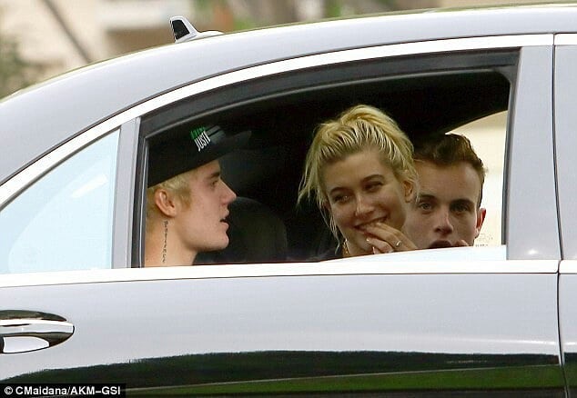 January 20, 2015. Hailey, Justin and Ryan Butler out in Los Angeles.