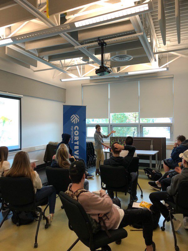 CortevaCA's tweet photo. An engaged group of students at the Ag101 event in Morinville, AB watched Solutions Center Rep Isabelle Thibout as she demonstrated the hybridization and cross pollination technique used by our canola breeders. #AgForLife #Ag101 https://t.co/UJUdIF6nSC