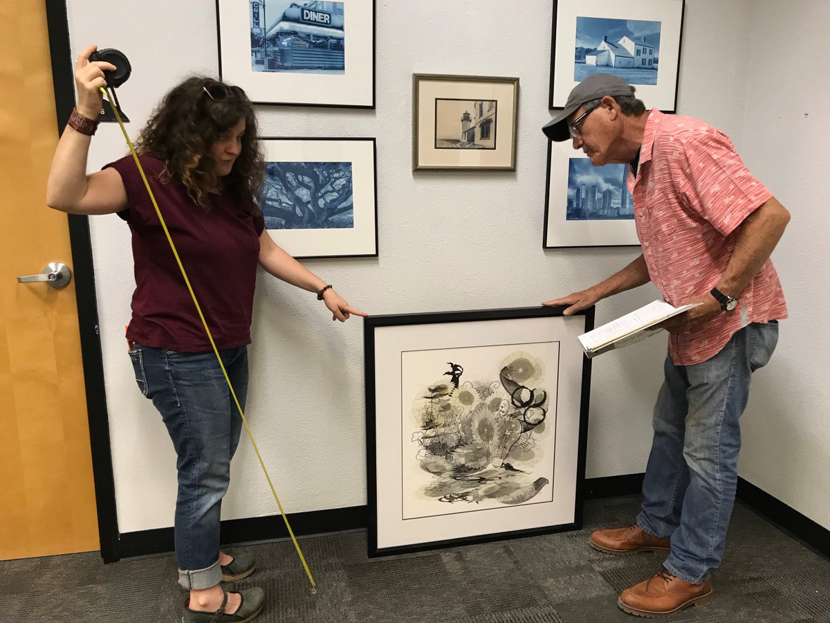 PCCArts's tweet photo. Pima students in the gallery practices class help David Andres prepare the West Campus Student Gallery for the current exhibit of Digital Arts student works in the the Dennis Landry Tribute. Reception: Sept. 20, 3-5 p.m. Free. The gallery is in the Santa Rita building, 2nd floor. https://t.co/DKSB3pWC1T