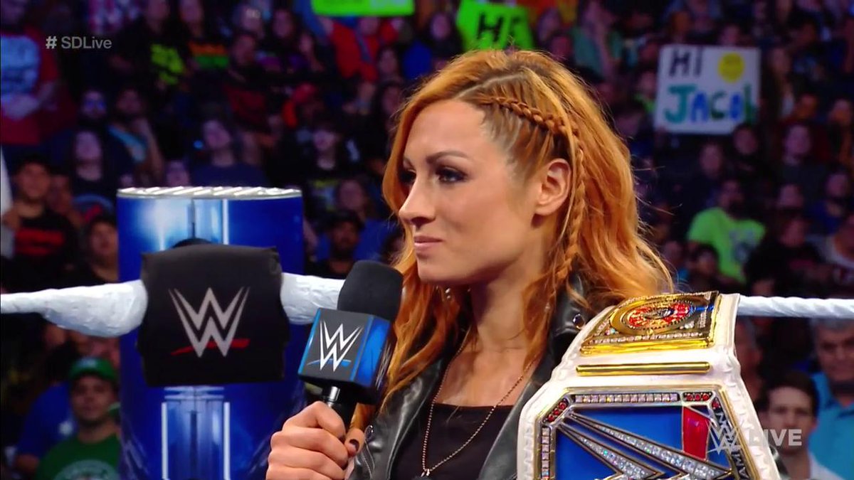 WWE's tweet photo. "I don't want you to shake my hand or put the title around my waist, I just want you to call me QUEEN!" - @BeckyLynchWWE 

#SDLive @MsCharlotteWWE https://t.co/PLQxly7kt0