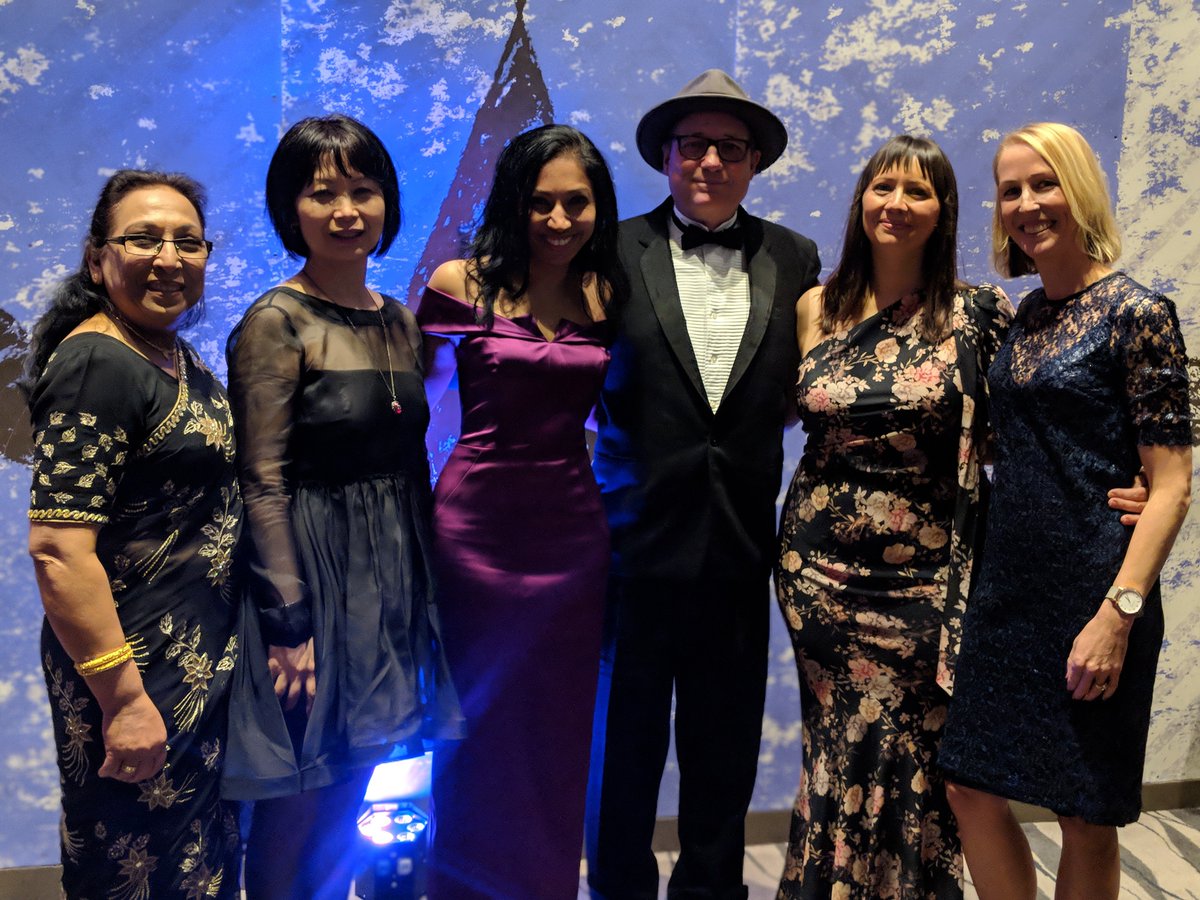 SenateSHJ_NZ's tweet photo. Celebrating #Suffrage125 today! What better way to honour our mana wahine than with a pic from the Women of Influence awards last night. Here's nominated consulting Partner Ziena Jalil with friends and whanau, including our head of digital Erin Leuschke  #WOINZ https://t.co/GU6fmmqE4m