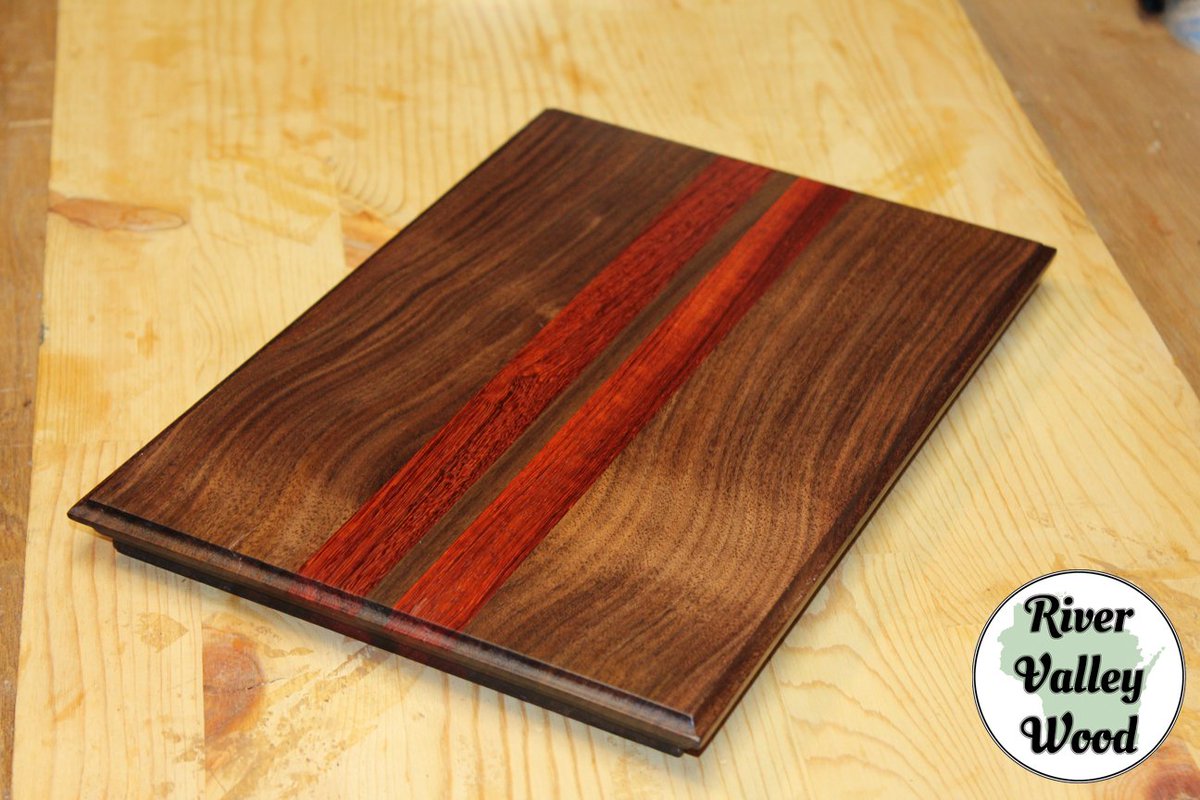 Walnut and Padauk cutting board available.  Detailed edges and beautiful wood grain. etsy.com/listing/585656… #cuttingboard #wood #walnut #padauk #gift #kitchen #cheeseboard #food #etsy #forsale