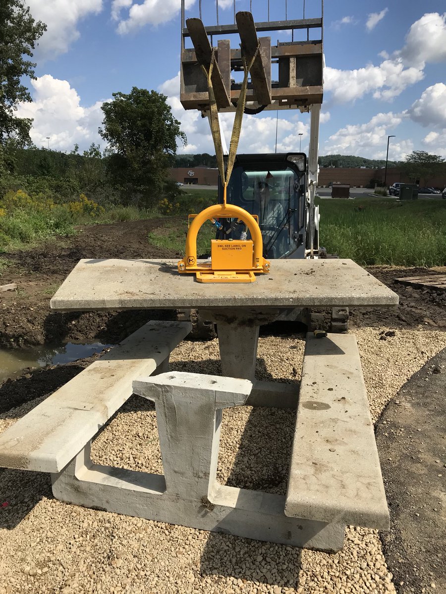 Using <a href="/MQuipGroup/">MQuip</a> vacuum lifter for setting 700lb concrete table tops. #hardscape