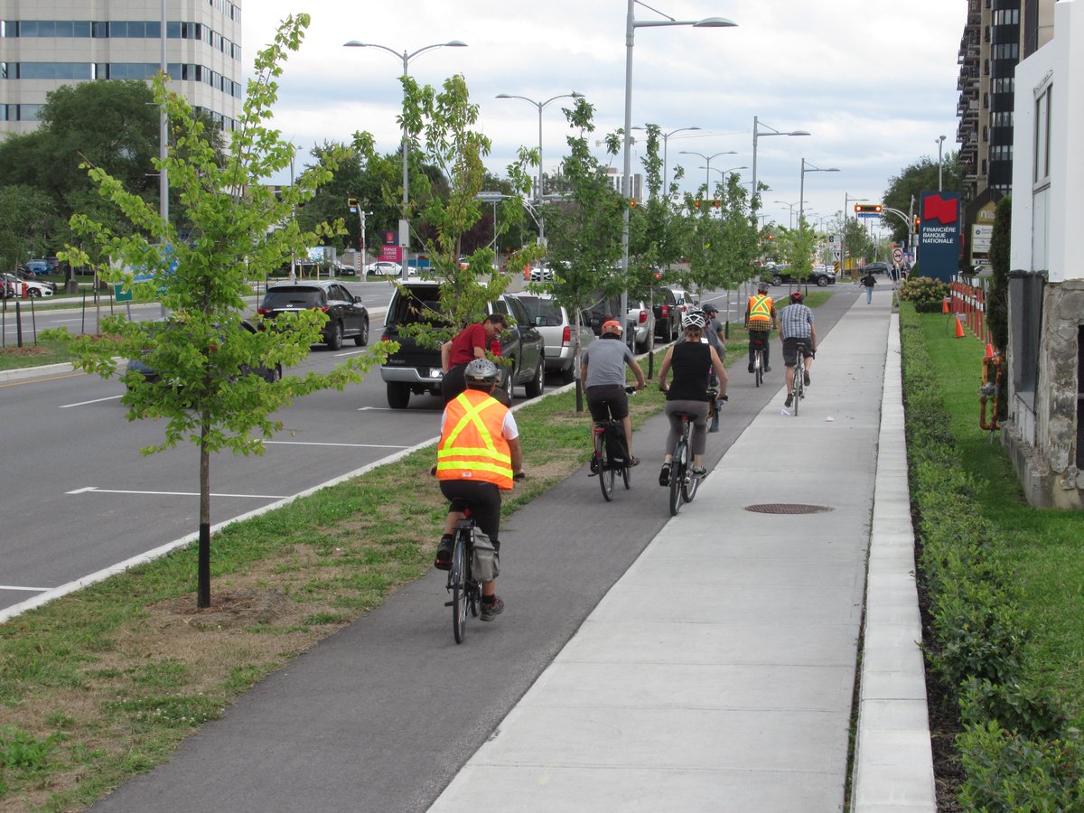 CyclistBartek's tweet image. Through a mix of retrofits and reconstructions, suburban Laval has implemented unidirectional cycle tracks on no less than 6 different arterial streets creating a #minimumgrid of protected bikeways. #velosympathique #veloMTL
