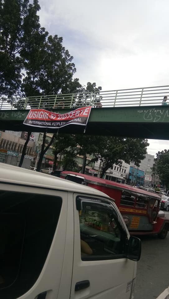 LOOK: Tarpaulin calling on the prosecution of President Duterte for crimes against the Filipino people in the International Peoples’ Tribunal #IPT2018 spotted along Quezon Avenue, Quezon City, PH. #ProescuteDuterte #JusticeForPH #StopTheAttacks