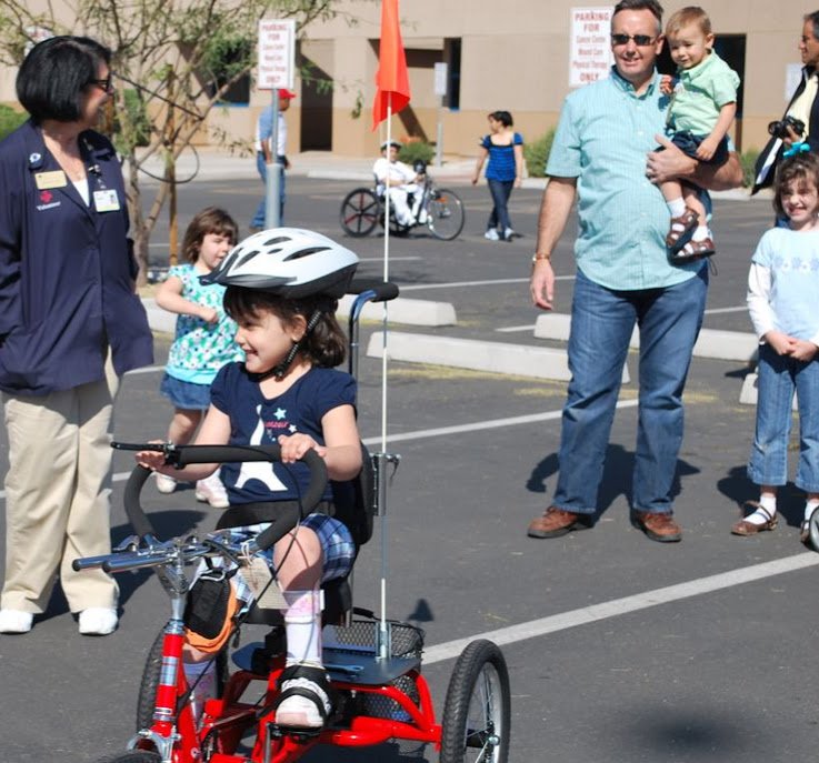 Receiving her 1st <a href="/SpinaBifidaAZ/">Spina Bifida AZ</a> cycle-so little back then! #sbaaz