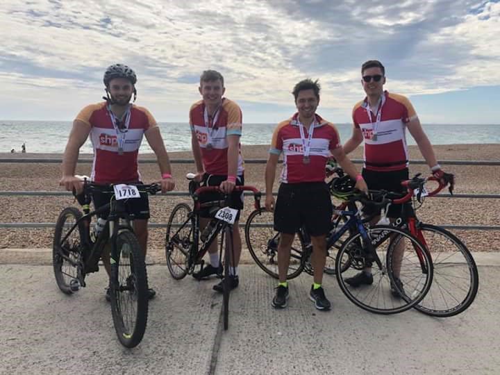 SHPcharity's tweet photo. Whose got that #FridayFeeling? We do after seeing this great photo from Team #BreakingACycle. The amazing Calvin, Matt, Woody and Craig who cycled 54miles from London to Brighton, raising over £1000 in the process. Check our their fundraising page here: https://t.co/5zX3XlehCr https://t.co/3MXhupwbRi