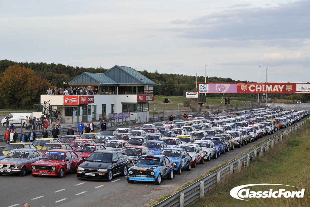 classicfordmag's tweet photo. There's a sight for sore eyes: 126 Mk1 and Mk2 Escorts (plus a few interlopers) at the old Chimay circuit in Belgium for last weekend's Escort Rally Special https://t.co/SoBae09rOR
