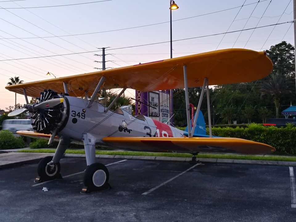 Kissimmee's tweet photo. In partnership with #WarbirdAdventures, @OsceolaHistory will have on display a #Steerman biplane in celebration of the Suited for Service Opening Reception tonight. Come take a picture with the plane and visit the new exhibit! https://t.co/Pnd7QO8MhN