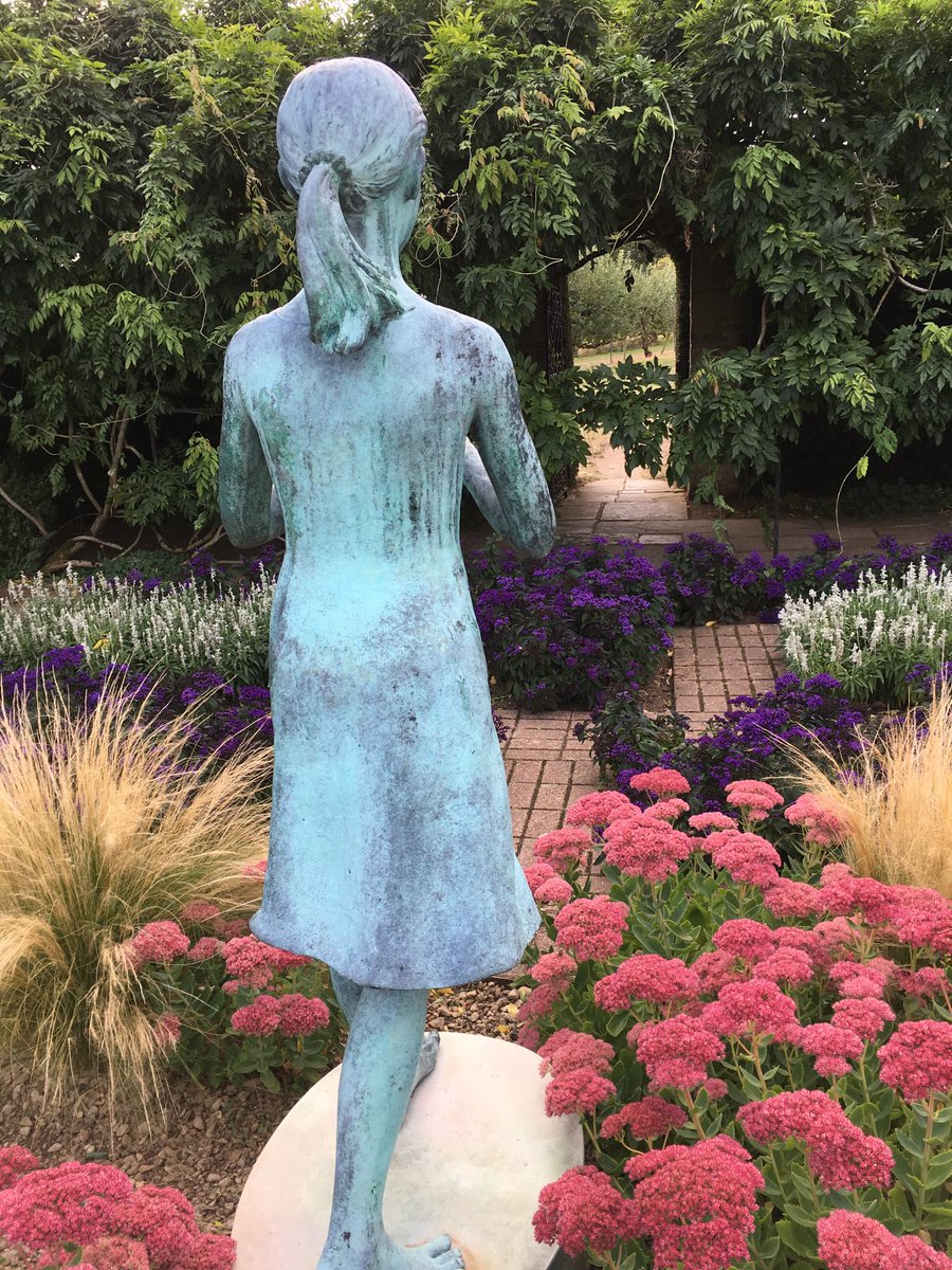 Love this statue ⁦<a href="/waterperry/">Waterperry Gardens</a>⁩ looking out through the archway to the orchard beyond. Romantic. So beautiful. #gardens to visit.