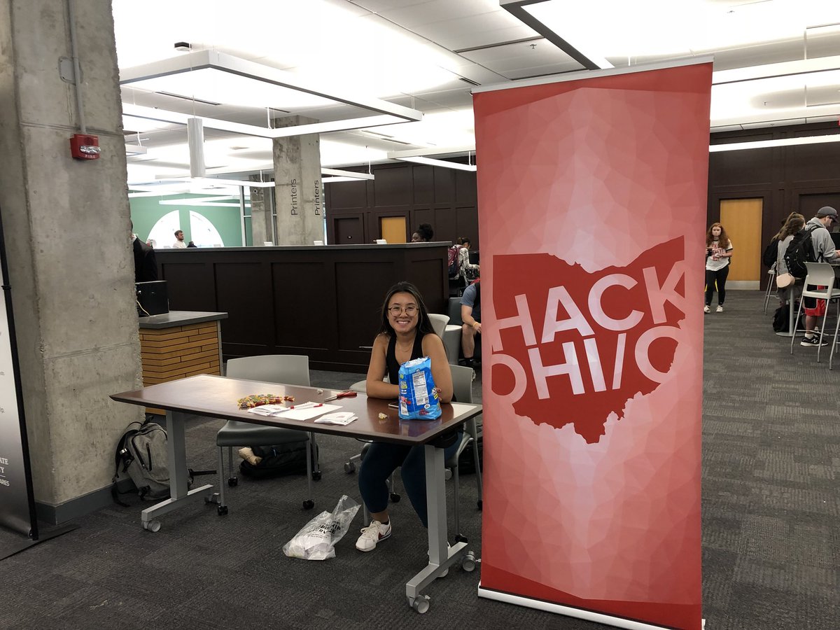 hackohio's tweet photo. HackOHI/O Table in the 18th Avenue Library today encouraging students to sign up for the hackathon! #letsbuildsomethingamazing #hackohio2018 https://t.co/COgMS2fTQD