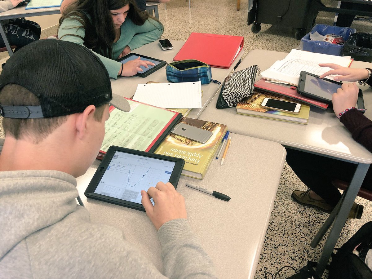 I don’t have a phone ban in my classes: engaged students don’t get distracted! Took this pic to show students using @Desmos marbleslide, and only noticed the untouched phones afterward. @ADHSMathDept #RCDSBMath #ITeachMath #MTBoS #MCF3M #QuadraticFunctions #BYOD