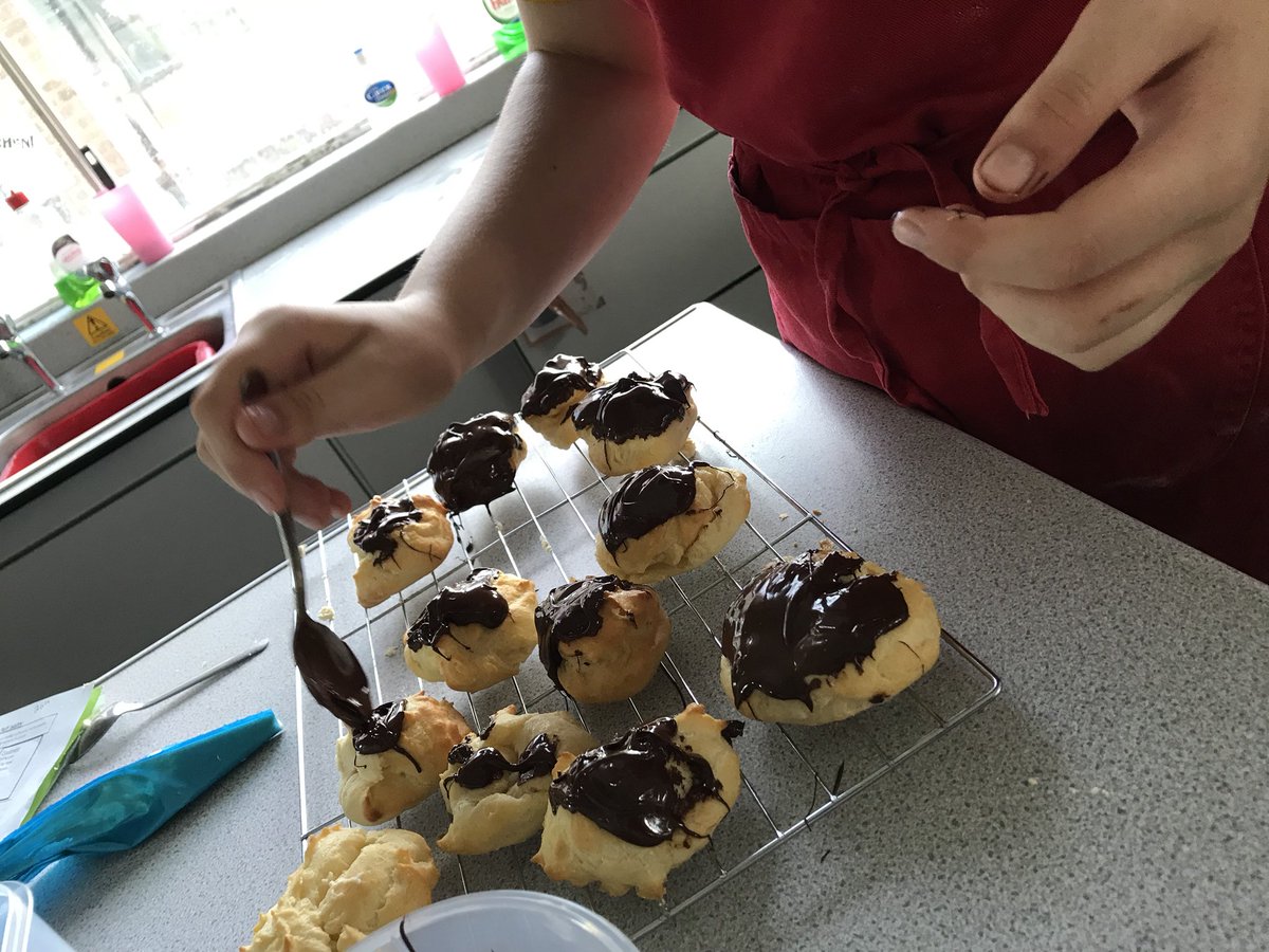 ChurchillMissT's tweet photo. Yr10 F&N making profiteroles in an hour.... BOOM! #chouxpastry #piping #raisingagent #whisking #melting #assembling #True determination! https://t.co/uqlOnuJb2B