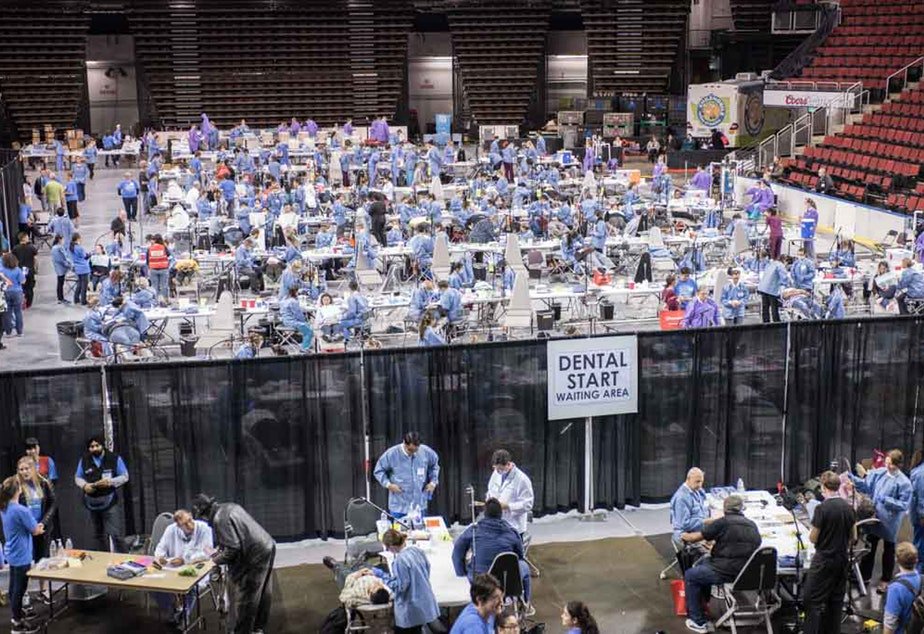 KUOW's tweet photo. Do you need free dental work, medical help or eye care? You can get it in @KeyArenaSeattle this week: https://t.co/pBUtPNTy85 https://t.co/m60kYKqGm9
