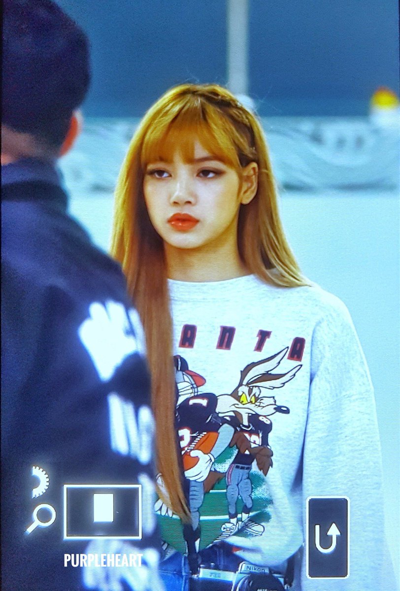 BLACKPINK's Lisa Showed Off Her Red Hair and Bangs | Teen Vogue